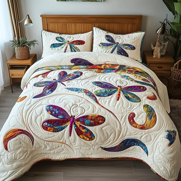 Elegance Dragonfly quilted 3-piece bedding set on a made bed with two matching pillow shams