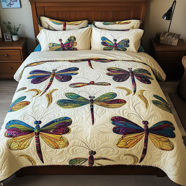 Elegance Dragonfly quilted 3-piece bedding set on a made bed with two matching pillow shams