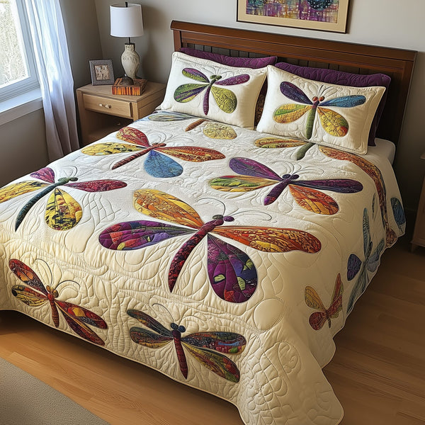 Elegance Dragonfly quilted 3-piece bedding set on a made bed with two matching pillow shams