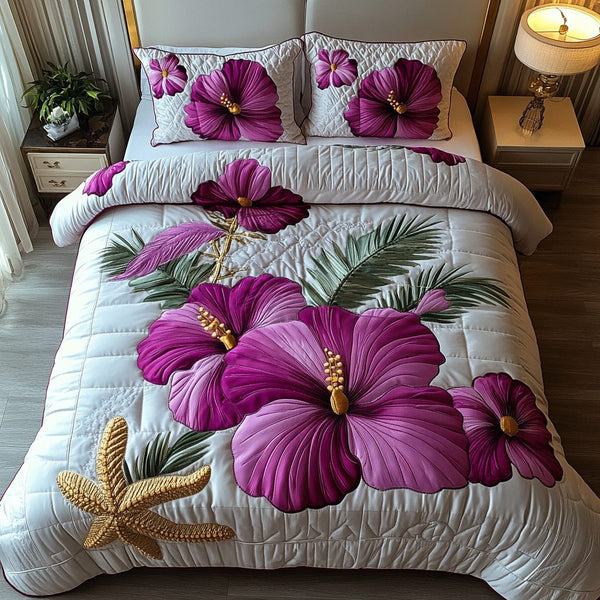 Elegant Bloom quilted 3-piece bedding set on a made bed with two matching pillow shams