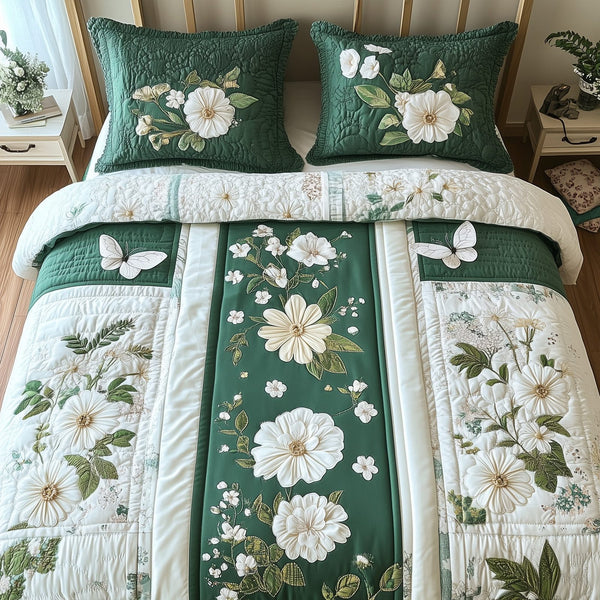 Elegant Blooming Spring quilted 3-piece bedding set on a made bed with two matching pillow shams