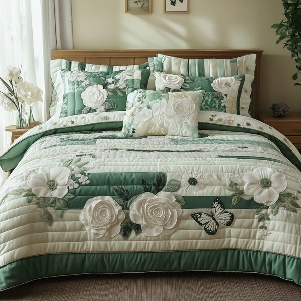Elegant Blooming Spring quilted 3-piece bedding set on a made bed with two matching pillow shams