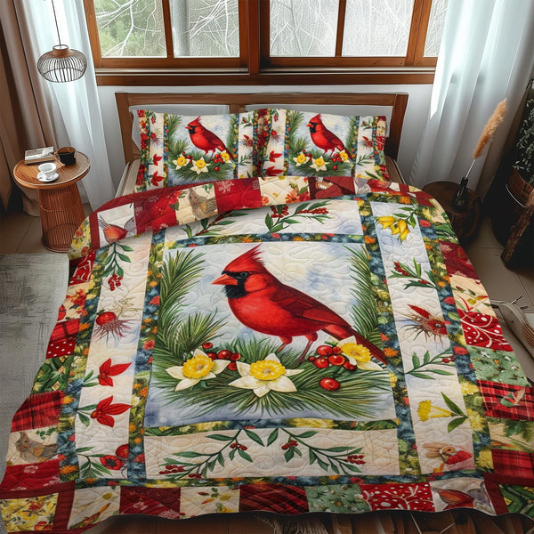 Elegant Cardinal Bird quilted 3-piece bedding set on a made bed with two matching pillow shams
