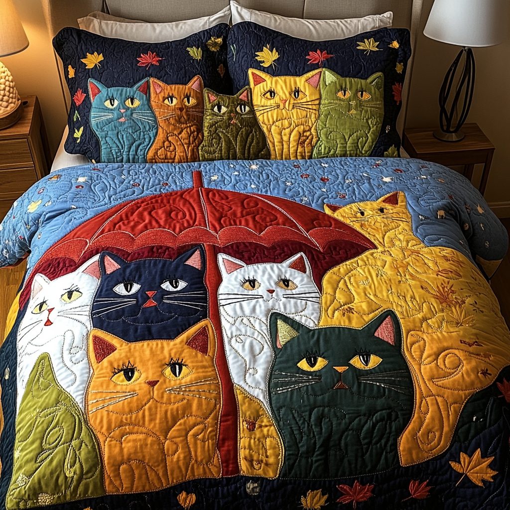 Elegant Cat quilted 3-piece bedding set on a made bed with two matching pillow shams