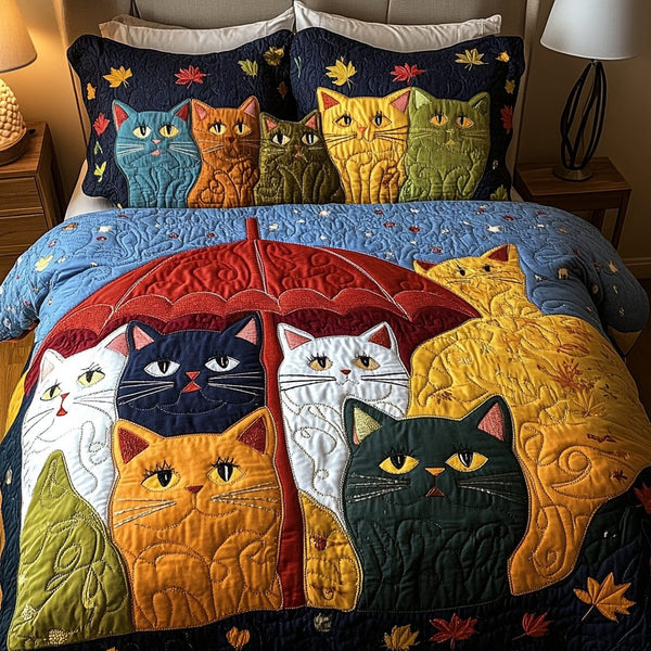 Elegant Cat quilted 3-piece bedding set on a made bed with two matching pillow shams