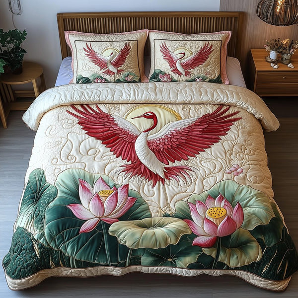 Elegant Crane quilted 3-piece bedding set on a made bed with two matching pillow shams