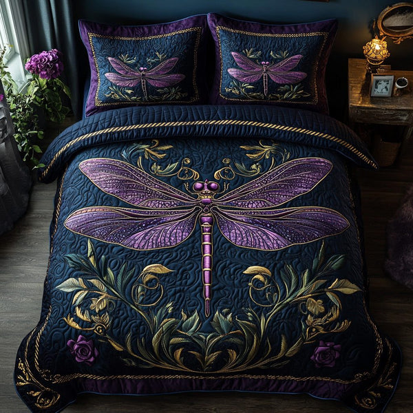 Elegant Dragonfly quilted 3-piece bedding set on a made bed with two matching pillow shams