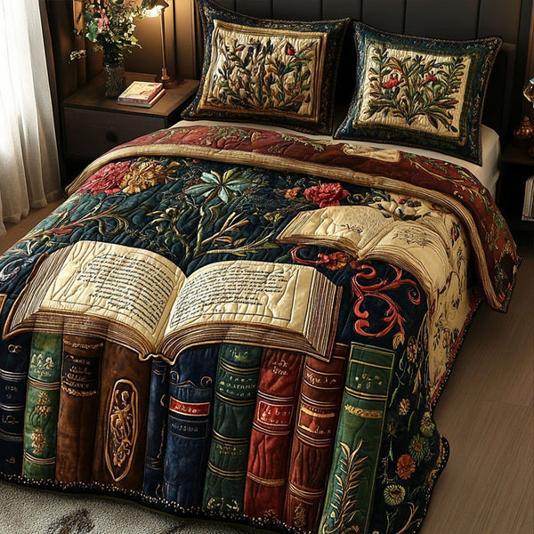 Elegant Epilogues quilted 3-piece bedding set on a made bed with two matching pillow shams