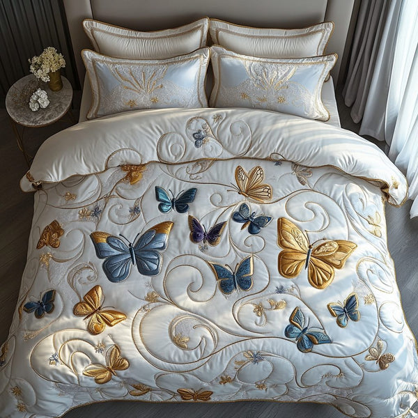 Elegant Flight quilted 3-piece bedding set on a made bed with two matching pillow shams