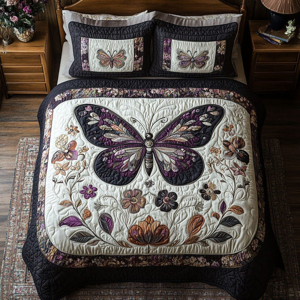 Elegant Flight quilted 3-piece bedding set on a made bed with two matching pillow shams