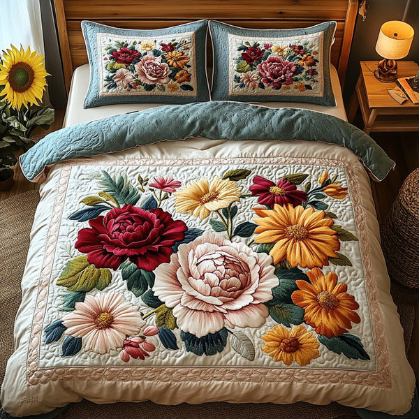 Elegant Floral Garden quilted 3-piece bedding set on a made bed with two matching pillow shams