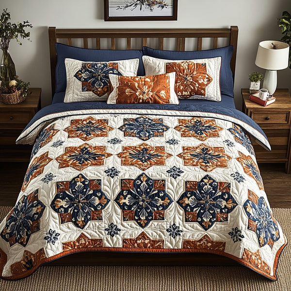 Elegant Garden Motif quilted 3-piece bedding set on a made bed with two matching pillow shams