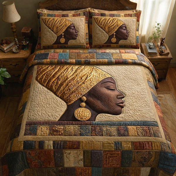 Elegant Sahara Woman quilted 3-piece bedding set on a made bed with two matching pillow shams