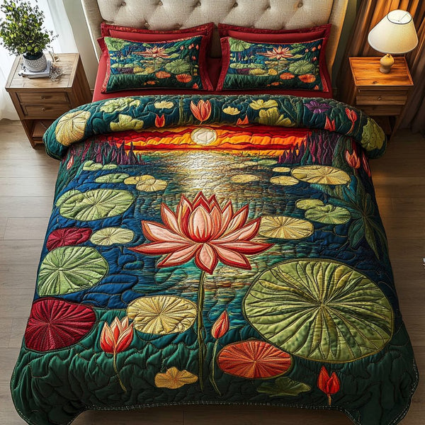 Elegant Waters quilted 3-piece bedding set on a made bed with two matching pillow shams