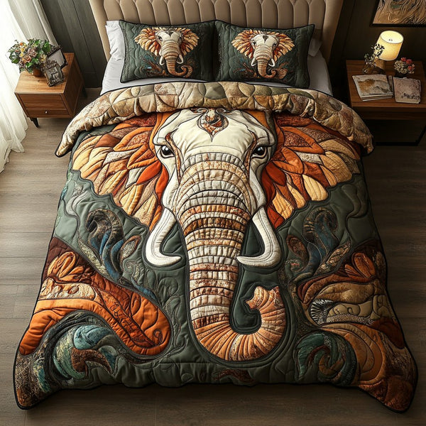 Elephant Dream quilted 3-piece bedding set on a made bed with two matching pillow shams