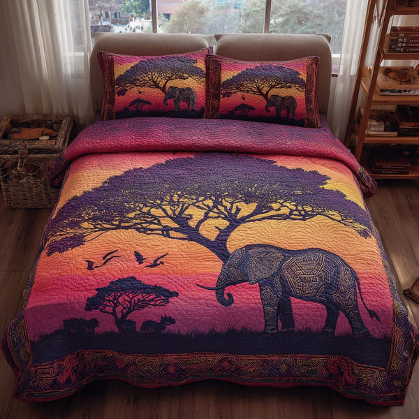 Elephant Dream quilted 3-piece bedding set on a made bed with two matching pillow shams