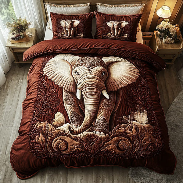 Elephant Dream quilted 3-piece bedding set on a made bed with two matching pillow shams