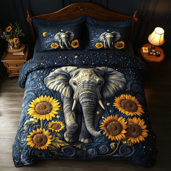 Elephant Dream quilted 3-piece bedding set on a made bed with two matching pillow shams
