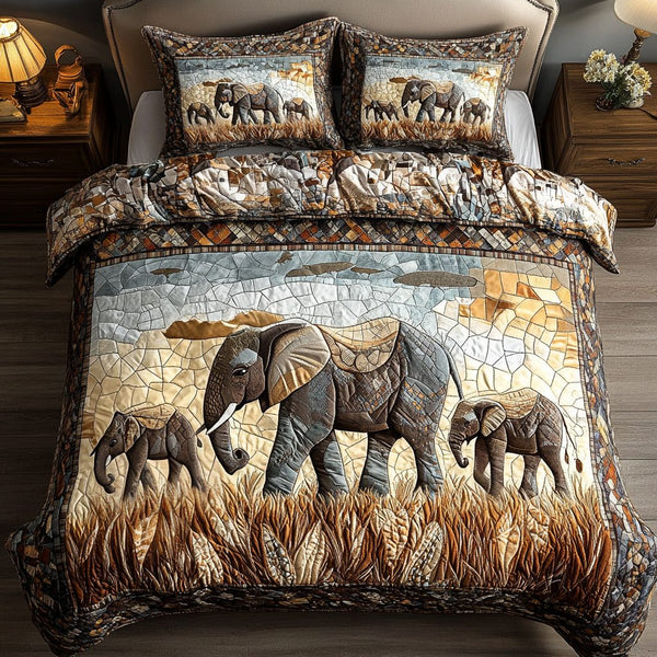 Elephant Dreams quilted 3-piece bedding set on a made bed with two matching pillow shams