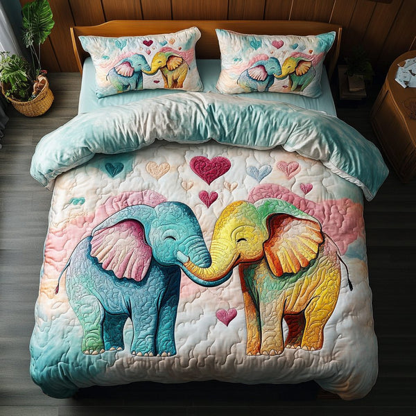 Elephant Embrace quilted 3-piece bedding set on a made bed with two matching pillow shams
