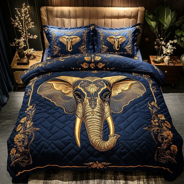 Elephant Grace quilted 3-piece bedding set on a made bed with two matching pillow shams