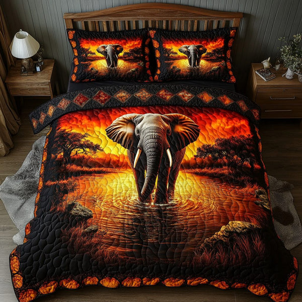 Elephant Grace quilted 3-piece bedding set on a made bed with two matching pillow shams