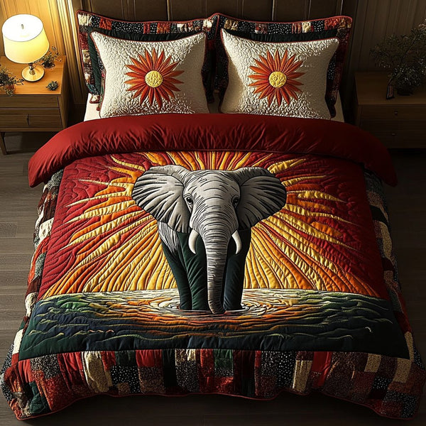 Elephant Horizon quilted 3-piece bedding set on a made bed with two matching pillow shams