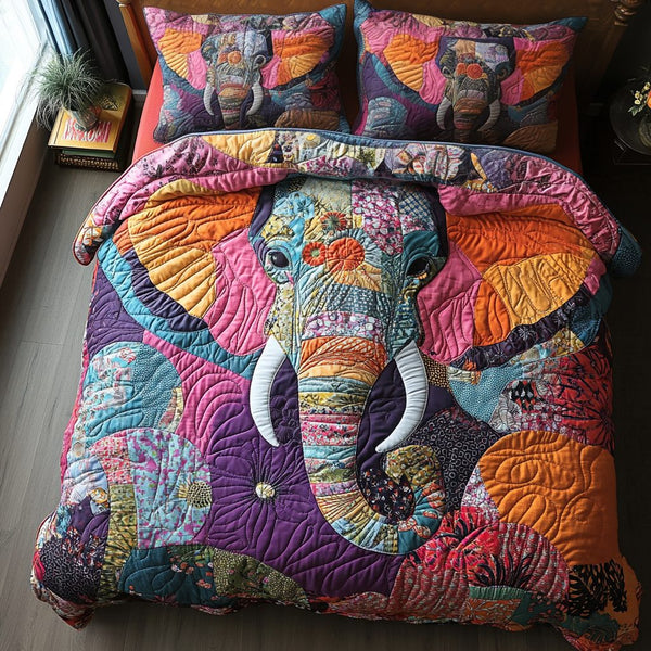 Elephant Journey quilted 3-piece bedding set on a made bed with two matching pillow shams