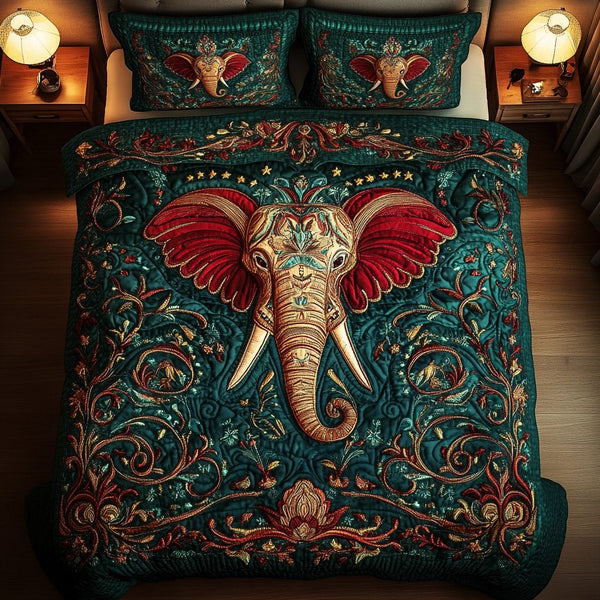 Elephant Majesty quilted 3-piece bedding set on a made bed with two matching pillow shams