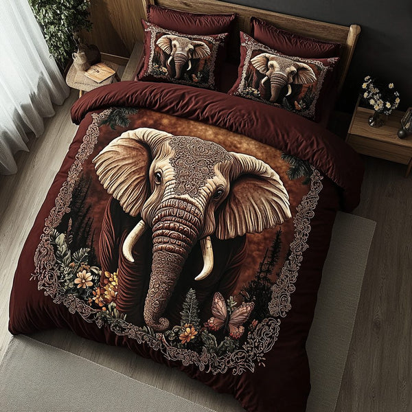 Elephant Majesty quilted 3-piece bedding set on a made bed with two matching pillow shams