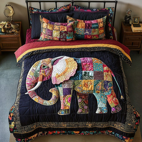 Elephant Majesty quilted 3-piece bedding set on a made bed with two matching pillow shams