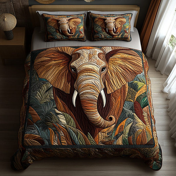 Elephant Oasis quilted 3-piece bedding set on a made bed with two matching pillow shams