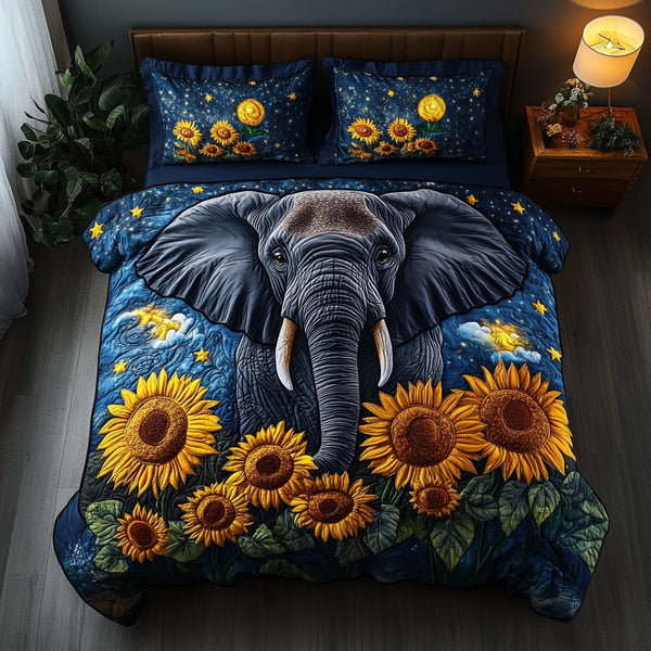Elephant Paradise quilted 3-piece bedding set on a made bed with two matching pillow shams