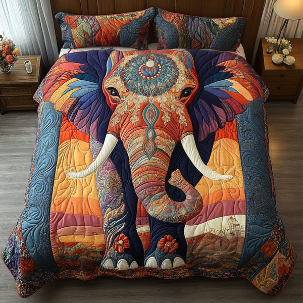 Elephant Path quilted 3-piece bedding set on a made bed with two matching pillow shams