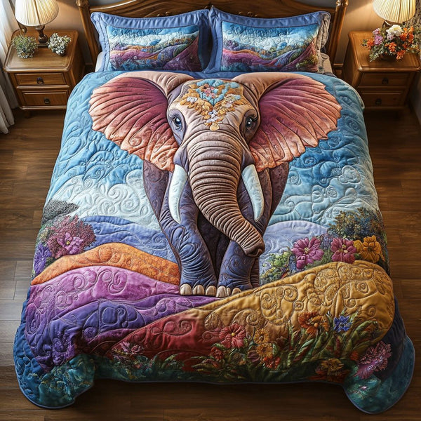 Elephant Spirit Haven quilted 3-piece bedding set on a made bed with two matching pillow shams
