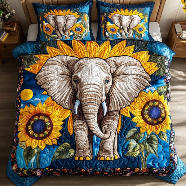 Elephant Sunflower Glow quilted 3-piece bedding set on a made bed with two matching pillow shams