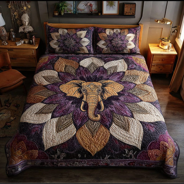 Elephant Symbol quilted 3-piece bedding set on a made bed with two matching pillow shams