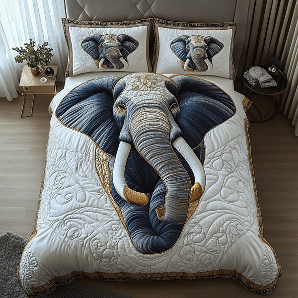 Elephant Tranquility quilted 3-piece bedding set on a made bed with two matching pillow shams