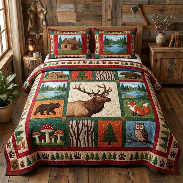 Elk Cabin quilted 3-piece bedding set on a made bed with two matching pillow shams