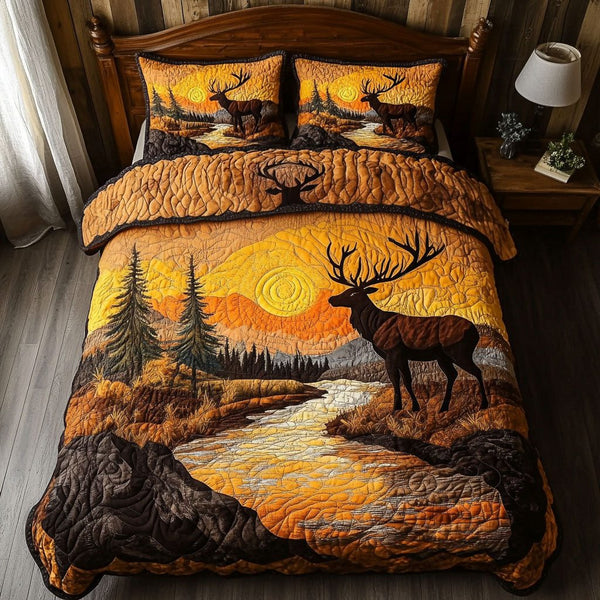 Elk Ridge Elegance quilted 3-piece bedding set on a made bed with two matching pillow shams