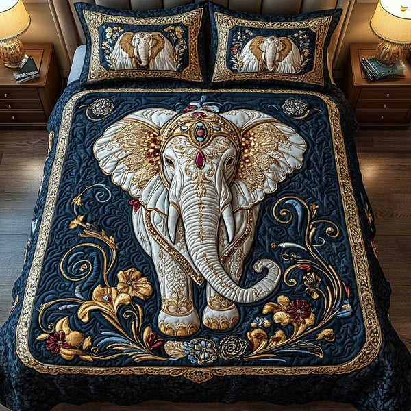Embellished Elephant quilted 3-piece bedding set on a made bed with two matching pillow shams