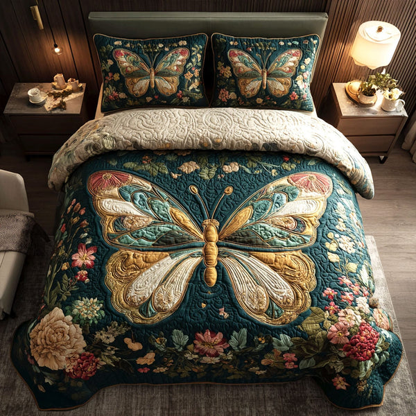 Emerald Blossomwing quilted 3-piece bedding set on a made bed with two matching pillow shams