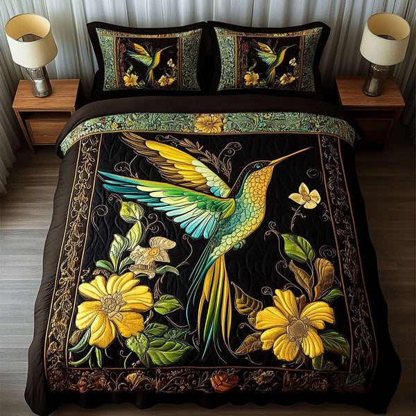 Emerald Breeze quilted 3-piece bedding set on a made bed with two matching pillow shams