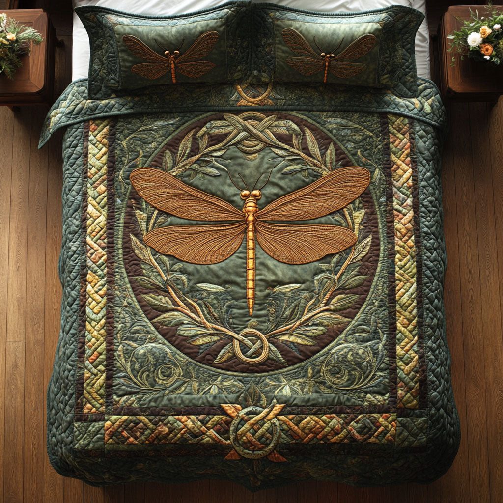 Emerald Dragonfly quilted 3-piece bedding set on a made bed with two matching pillow shams