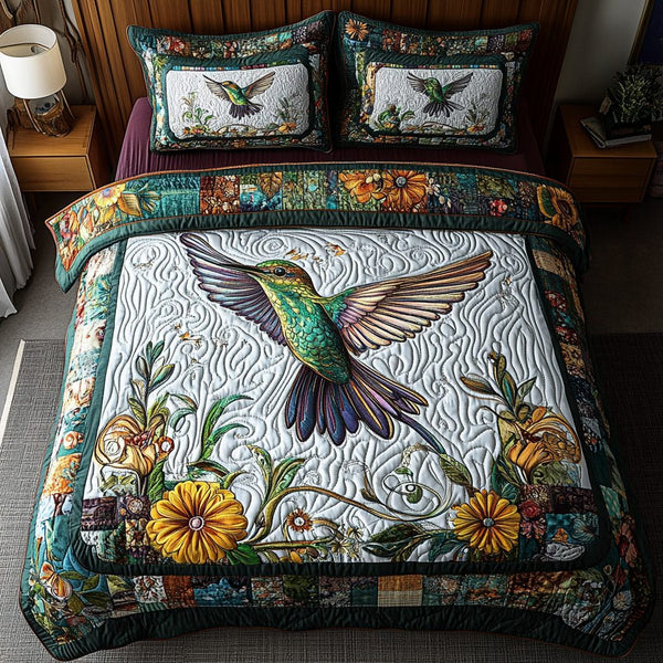 Emerald Hover quilted 3-piece bedding set on a made bed with two matching pillow shams