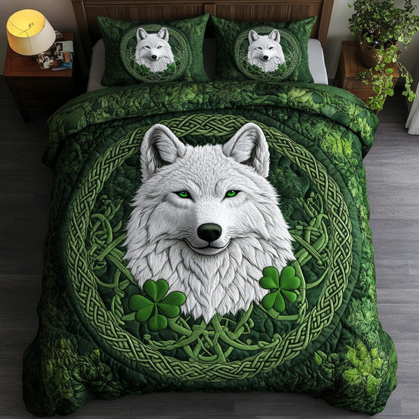 Emerald Howl quilted 3-piece bedding set on a made bed with two matching pillow shams