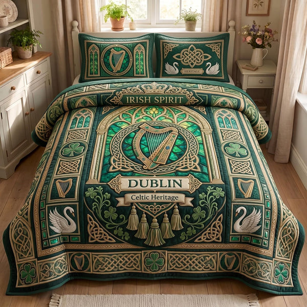 Emerald Isle quilted 3-piece bedding set on a made bed with two matching pillow shams