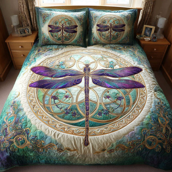 Emerald Spirit quilted 3-piece bedding set on a made bed with two matching pillow shams