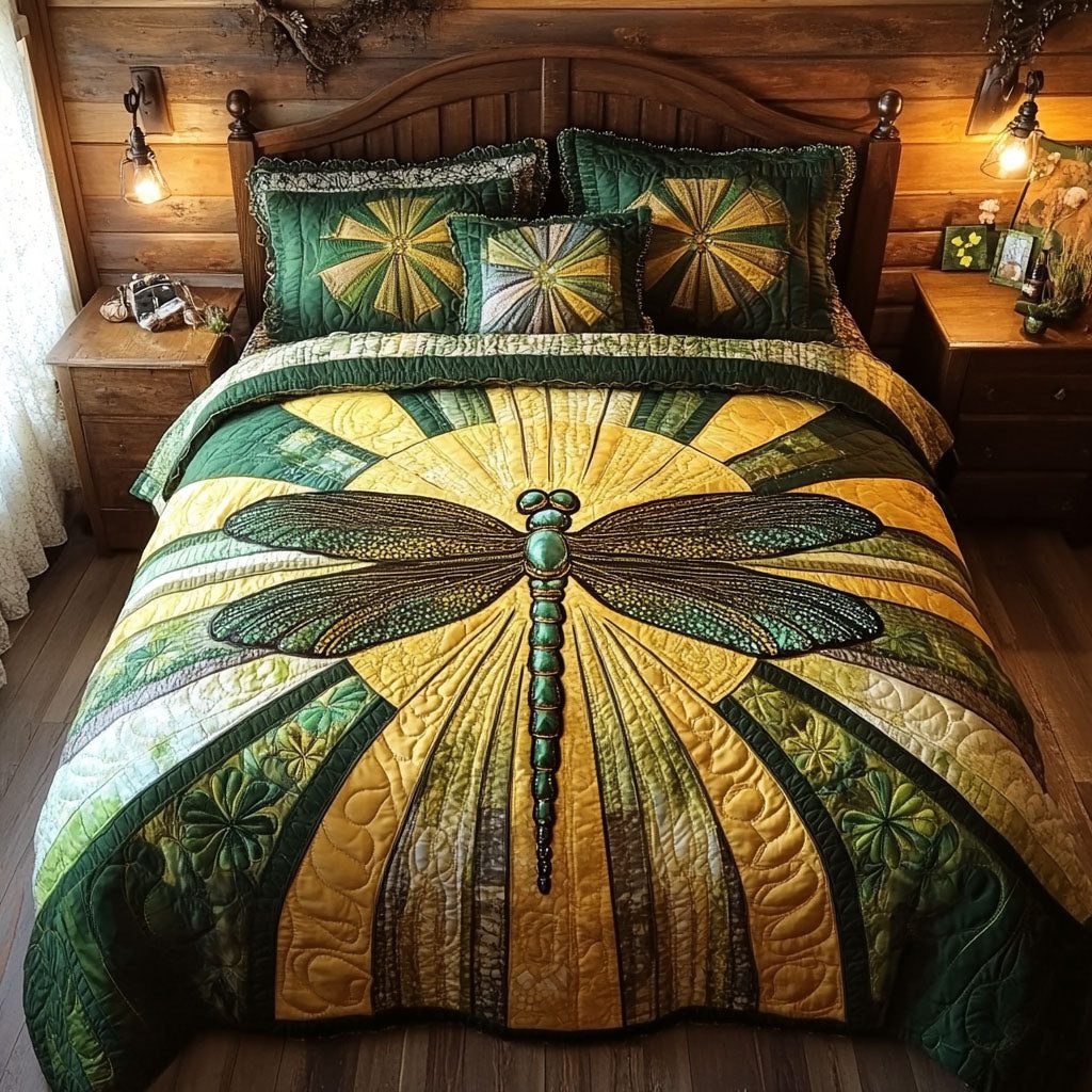 Emerald Wings quilted 3-piece bedding set on a made bed with two matching pillow shams