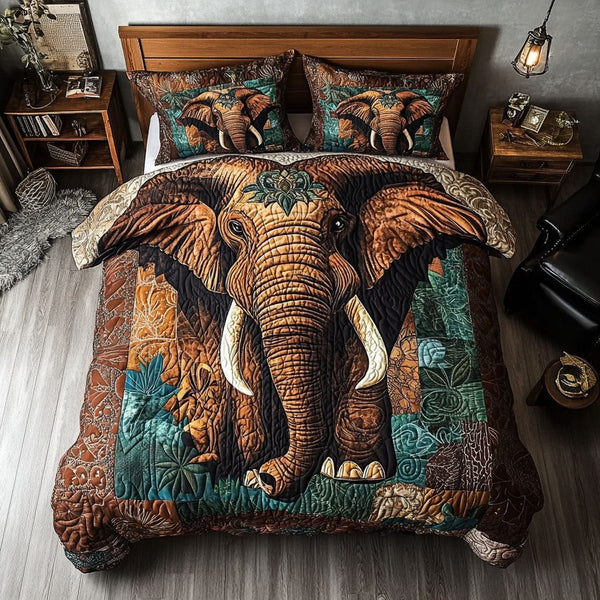 Emperor Elephant quilted 3-piece bedding set on a made bed with two matching pillow shams